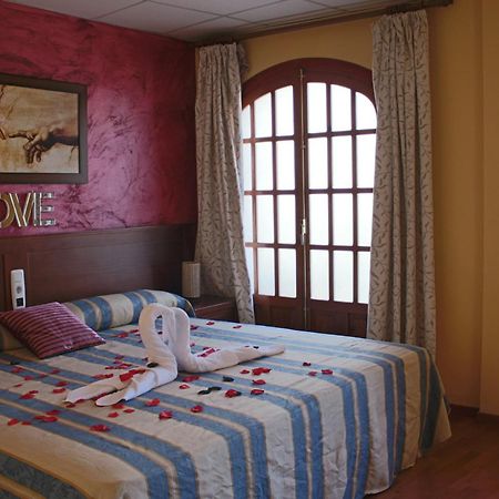 Hotel La Curva Альболоте Номер фото